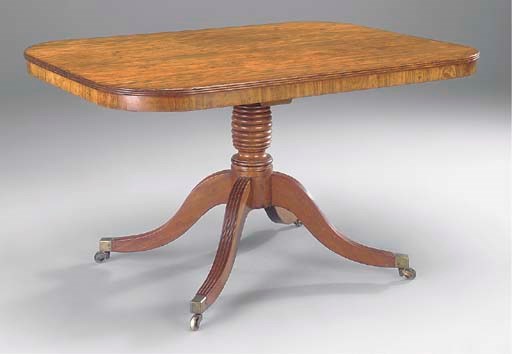 A REGENCY MAHOGANY RECTANGULAR BREAKFAST TABLE