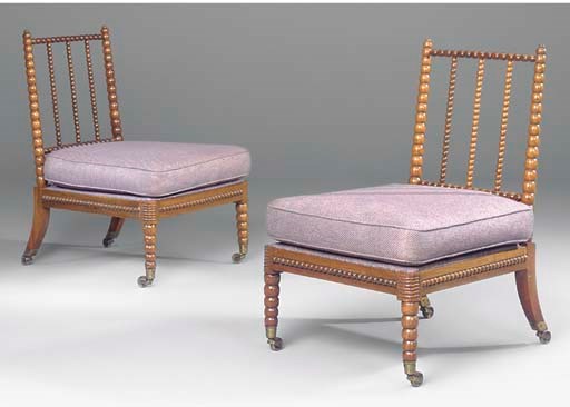 A PAIR OF GEORGE IV ROSEWOOD BOBBIN TURNED EASY CHAIRS