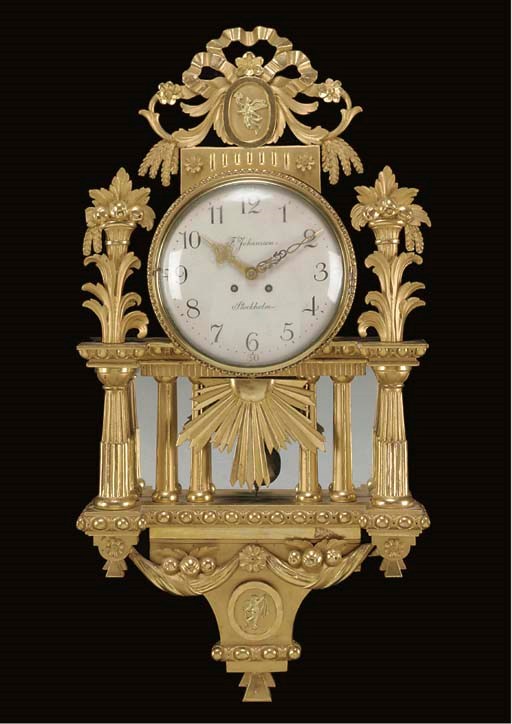 A Swedish giltwood wall clock