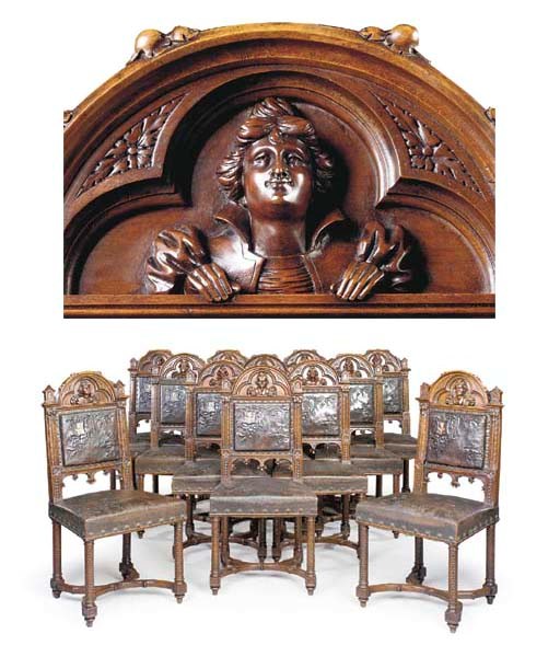 A SET OF TWELVE FRENCH WALNUT DINING CHAIRS