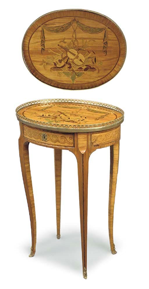 A LOUIS XV ORMOLU-MOUNTED TULIPWOOD AND MARQUETRY CENTRE TABLE