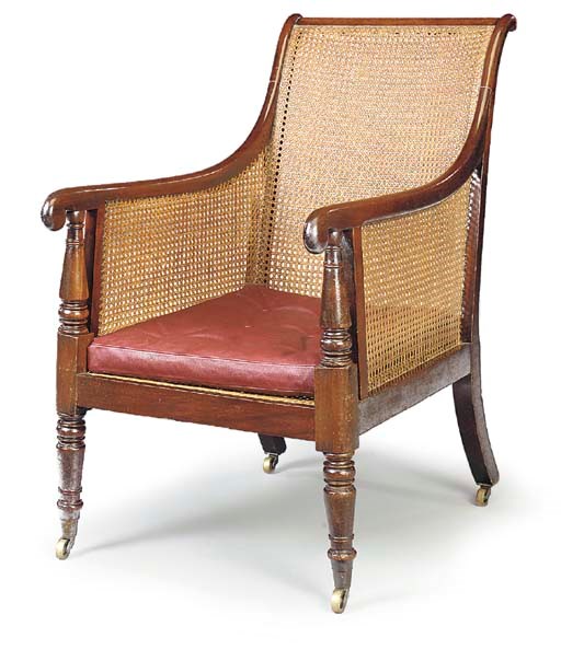 A REGENCY MAHOGANY CANED BERGERE