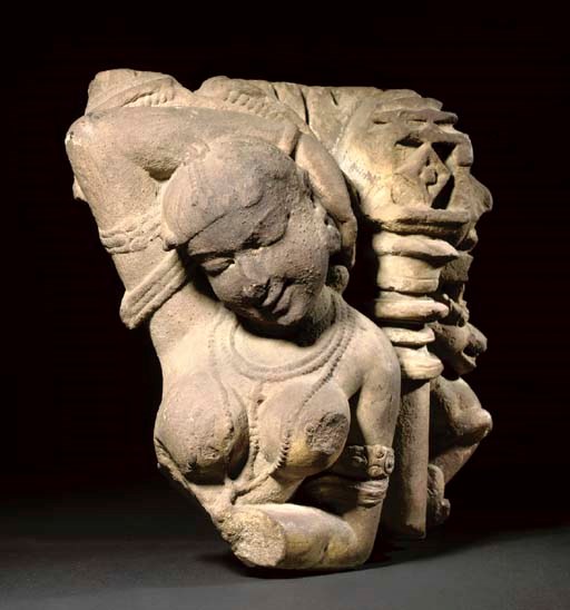 A Red Sandstone Bust of a Celestial Woman