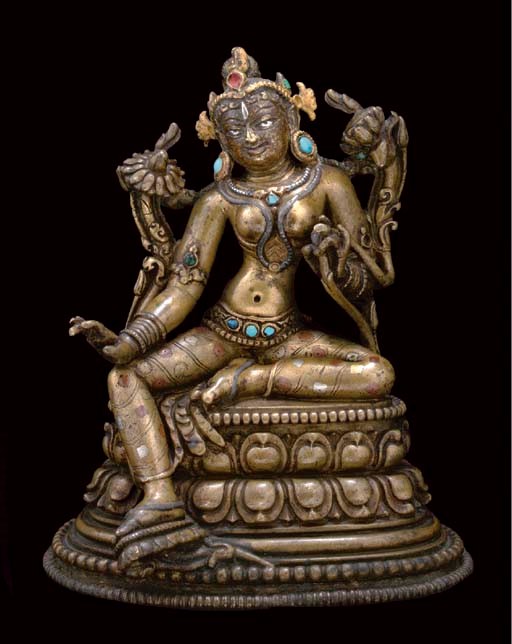A Rare Silver and Copper Inlaid Bronze Figure of Tara