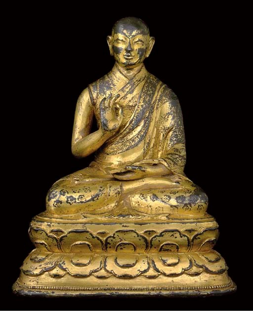 A Gilt Bronze Figure of a Lama