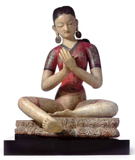 A Polychromed Wood Figure of Tara
