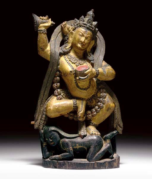 A POLYCHROME AND GILT WOOD FIGURE OF VAJRAVARAHI