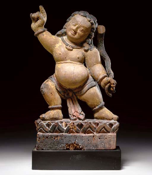 A Carved Wood Figure of Bhimsen