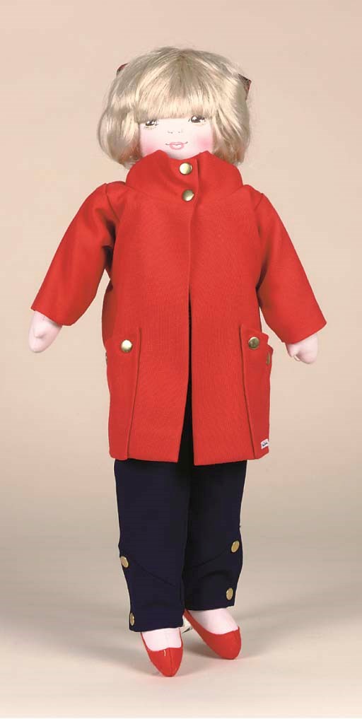 A DOLL DRESSED BY PIERRE CARDIN