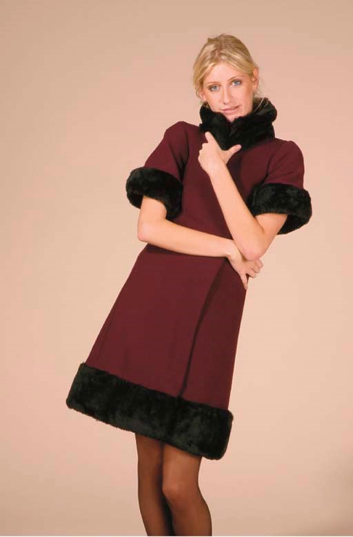 A 3/4 COAT OF PURPLE TWILL WITH SHORT SLEEVES BY BIBA trimmed with black fake fur; a waistcoat applied with bottle green sequins; a jacket of quilted vivid pink corduroy, size 10; and a small collection of costume, all labelled BIBA, 1970s(a lot) See Illustration