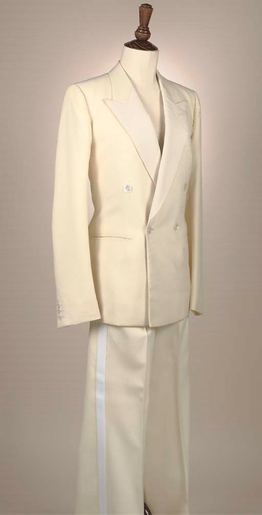 TWO MEN'S SUITS BY TOMMY NUTTER, 1980s AND ANOTHER SUIT