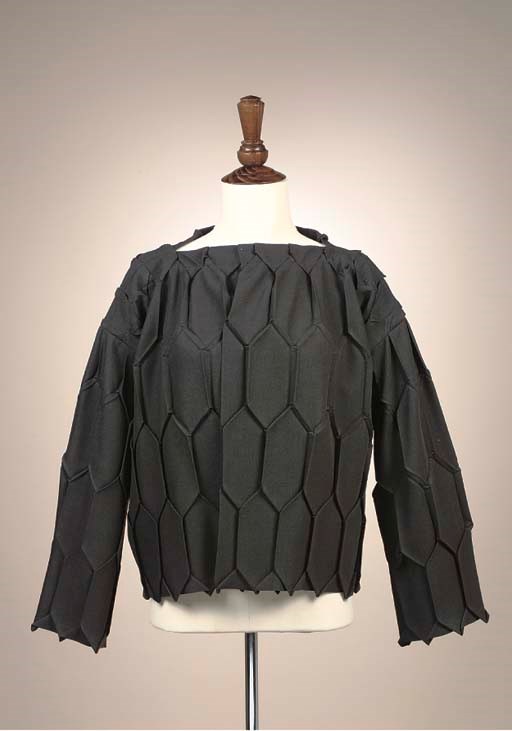 A SHORT JACKET OF GREY SERGE