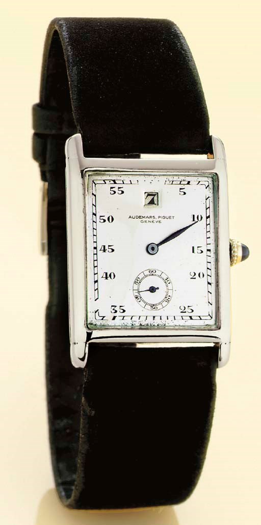 AUDEMARS PIGUET. A RARE 18K WHITE GOLD RECTANGULAR JUMP HOUR WRISTWATCH
