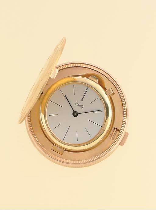 PIAGET. AN 18K GOLD TWENTY DOLLAR COIN WATCH