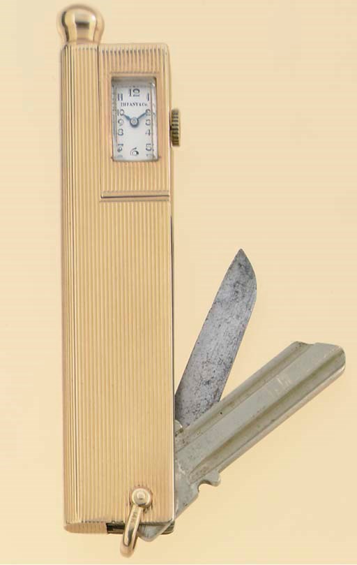 PERY WATCH. AN UNUSUAL 14K GOLD NOVELTY WATCH WITH PEN, FOLDING KNIFE AND KEY