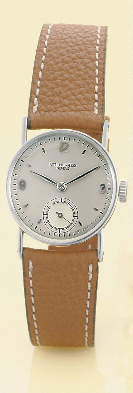 PATEK PHILIPPE. A FINE AND RARE STAINLESS STEEL WRISTWATCH WITH TWO-TONE DIAL