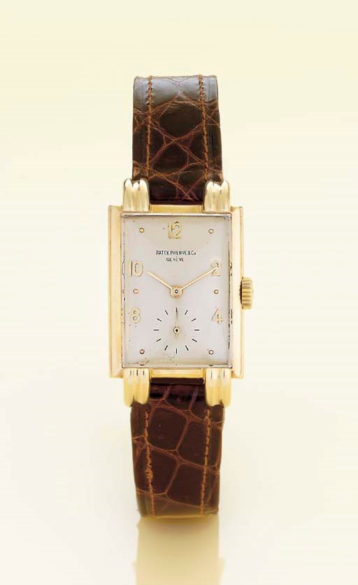 PATEK PHILIPPE. A FINE AND RARE 18K GOLD RECTANGULAR WRISTWATCH