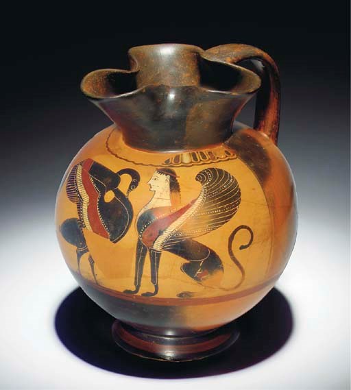 A LARGE LATE CORINTHIAN BLACK-FIGURE OINOCHOE, NEAR THE LOTUS CROSS PAINTER