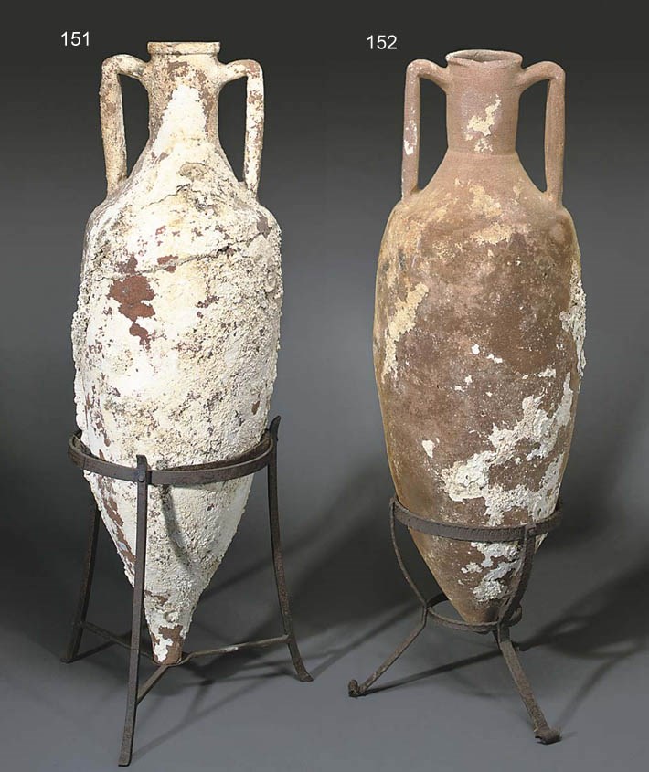 A ROMAN POTTERY WINE AMPHORA