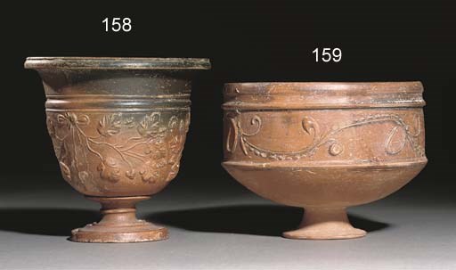 A ROMAN RED-WARE POTTERY CHALICE