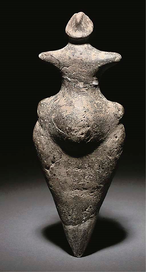 A NEOLITHIC POTTERY STEATOPYGOUS IDOL