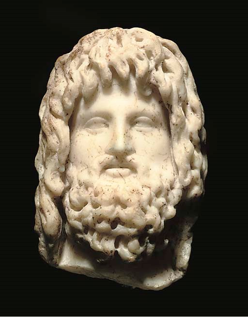 A ROMAN MARBLE HEAD OF ZEUS-SERAPIS