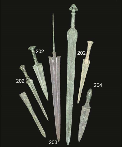 A GROUP OF NORTH-WEST PERSIAN BRONZE SWORDS AND VESSELS