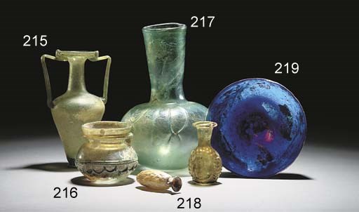 A ROMAN GREEN GLASS AMPHORISKOS