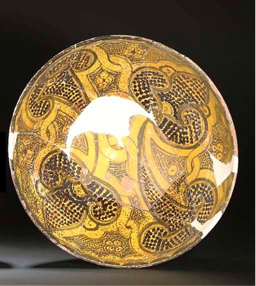 A LARGE NISHAPUR OR SAMARKAND GLAZED POTTERY BOWL, IRAN OR CENTRAL ASIA, 10TH/11TH CENTURY