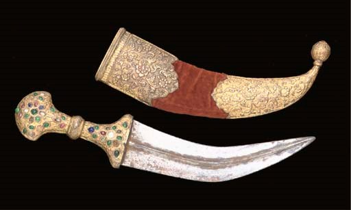 A JAMBAYYIA WITH GILT-COPPER HILT AND SHEATH, KUTCH, 19TH CENTURY