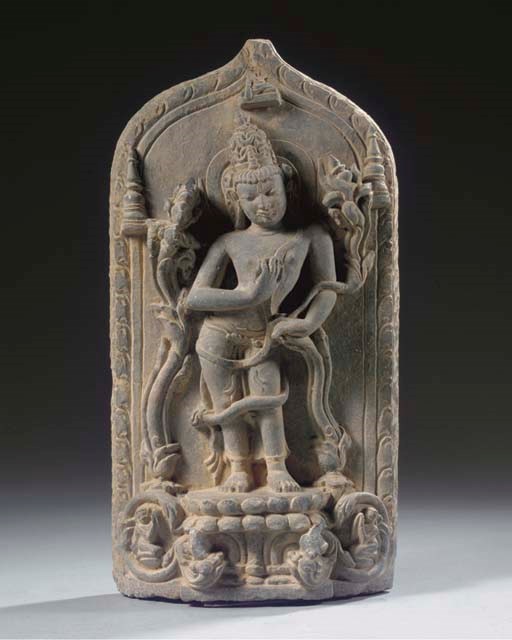 A Northeast Indian, Pala style, phyllite stone stele with Maitreya