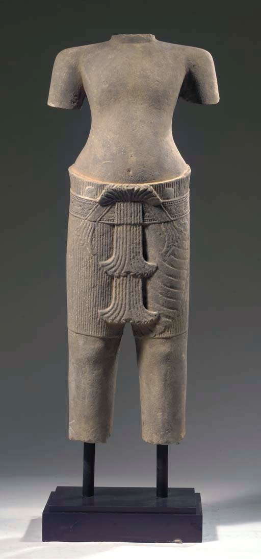 A Khmer, Angkor Vat style, sandstone torso of probably Vishnu