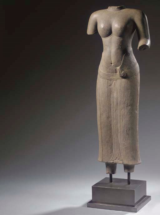 A Khmer, Baphuon style, polished sandstone female torso