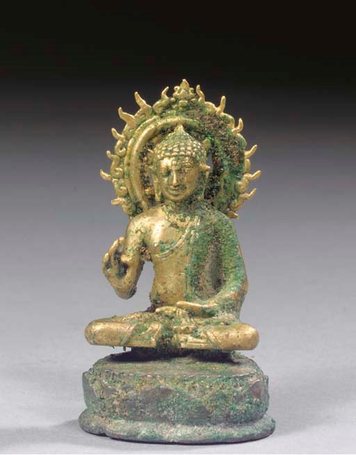 A Javanese gold and silver figure of Buddha Sakyamuni