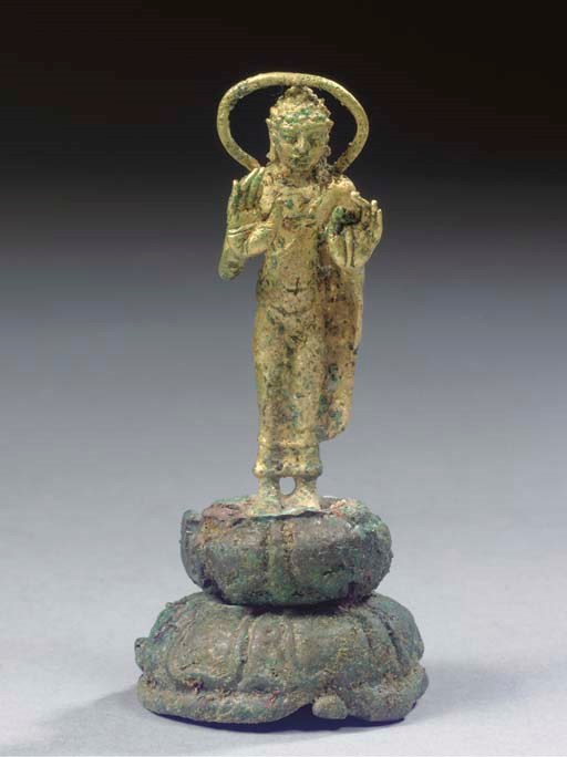 A Javanese gold and silver figure of Buddha Sakyamuni