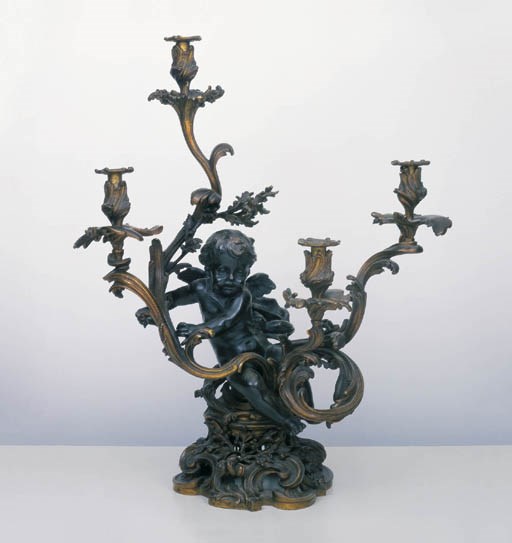 A FRENCH BRONZE AND GILT BRONZE FOUR-LIGHT CANDELABRUM