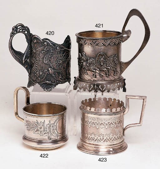 A RUSSIAN SILVER TEA GLASS HOLDER
