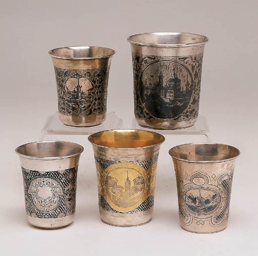 A GROUP OF FIVE RUSSIAN SILVER, GILT AND NIELLO BEAKERS