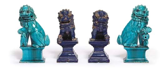 A PAIR OF CHINESE TURQUOISE-GLAZED FIGURES OF BUDDHIST LIONS