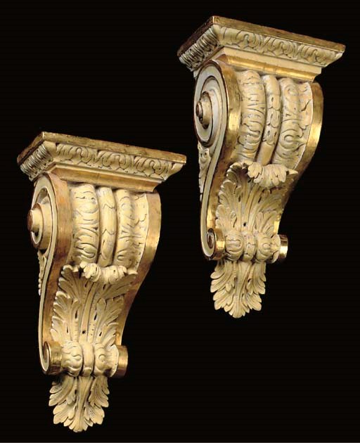 A PAIR OF OCHRE-PAINTED AND PARCEL-GILT WALL BRACKETS