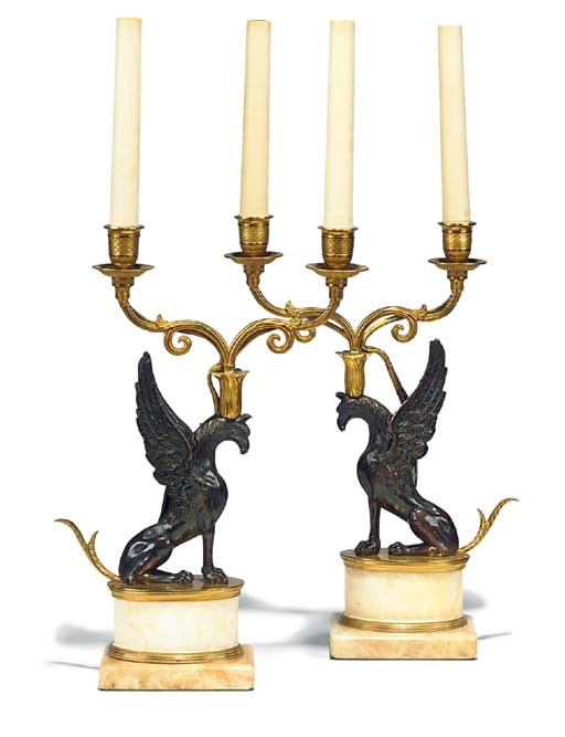 A PAIR OF REGENCY BRONZE AND ORMOLU TWO-LIGHT CANDELABRA