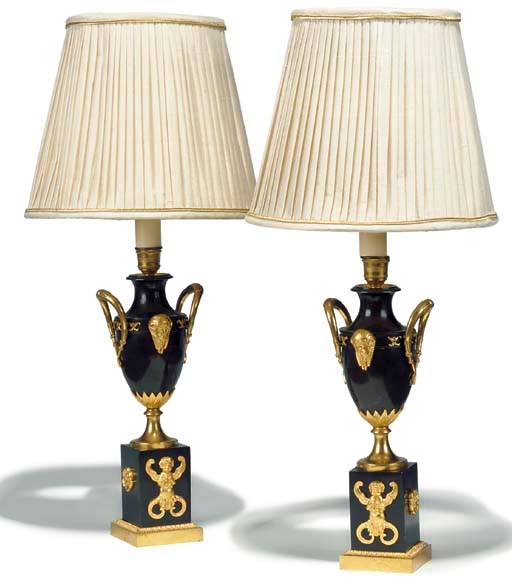 A PAIR OF ORMOLU-MOUNTED BRONZE TABLE LAMPS