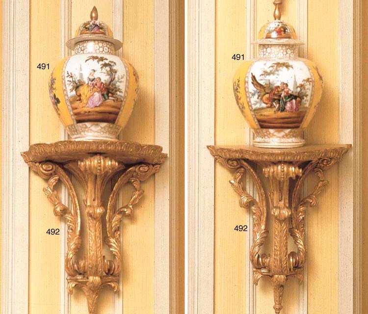 A PAIR OF DRESDEN YELLOW-GROUND BALUSTER VASES AND DOMED COVERS