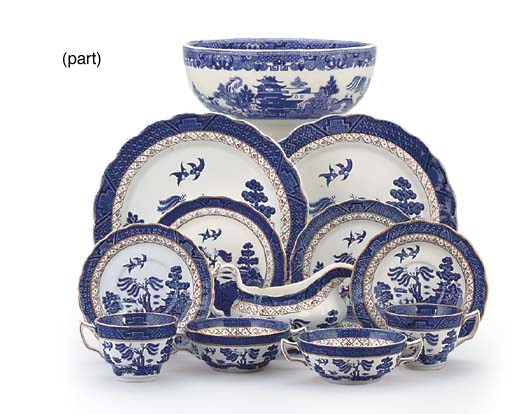 A BOOTHS BLUE AND WHITE WILLOW PATTERN PART SERVICE AND A WEDGWOOD BOWL