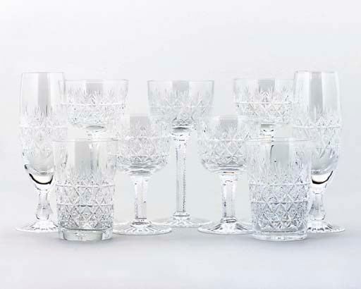 AN EXTENSIVE CUT-GLASS COMPOSITE TABLE SERVICE