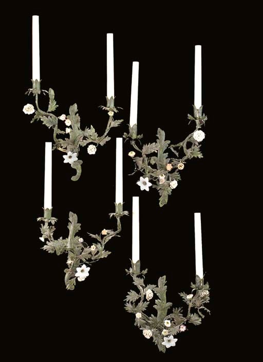 A SET OF FOUR GREEN-PAINTED TOLE AND SOFT-PASTE PORCELAIN TWO-LIGHT WALL-LIGHTS