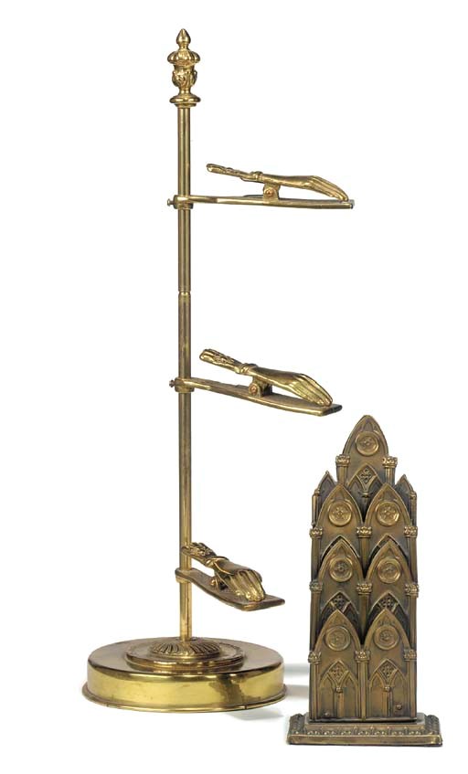 A VICTORIAN BRASS LETTER-HOLDER
