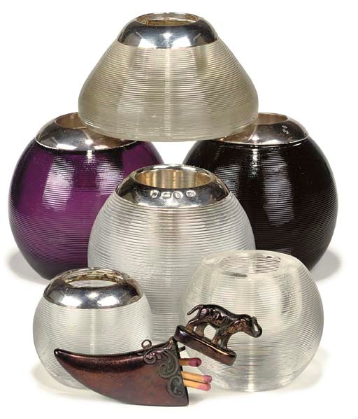 A COLLECTION OF SIX SILVER-PLATED AND SILVER-MOUNTED MATCH-GLOBES