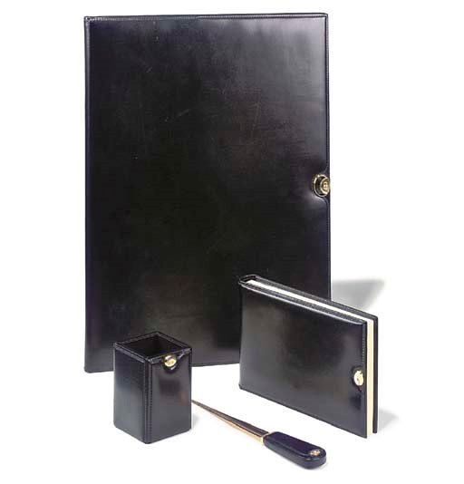 A MODERN BRASS AND CHROME-MOUNTED BLACK LEATHER DESK-SET
