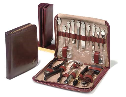 TWO LEATHER-BOUND PORTABLE TOOL KITS